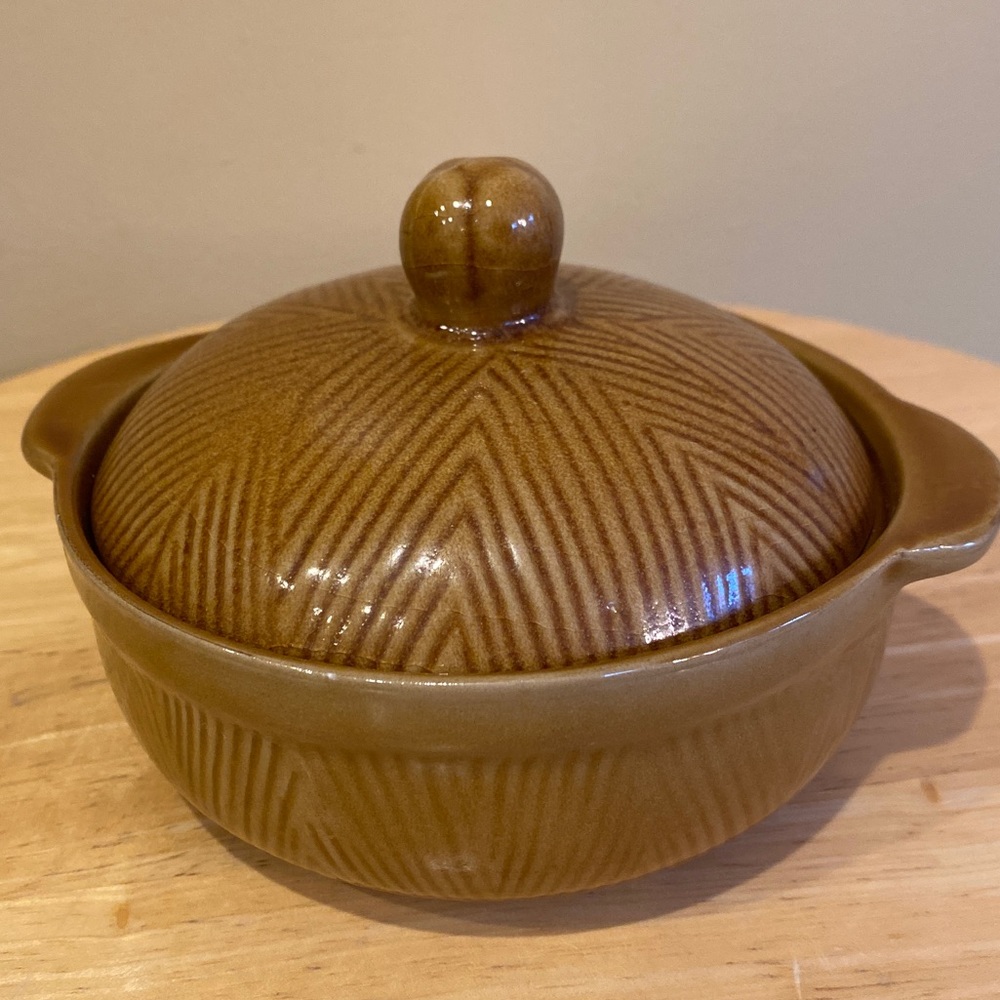 Small dish container with lid.